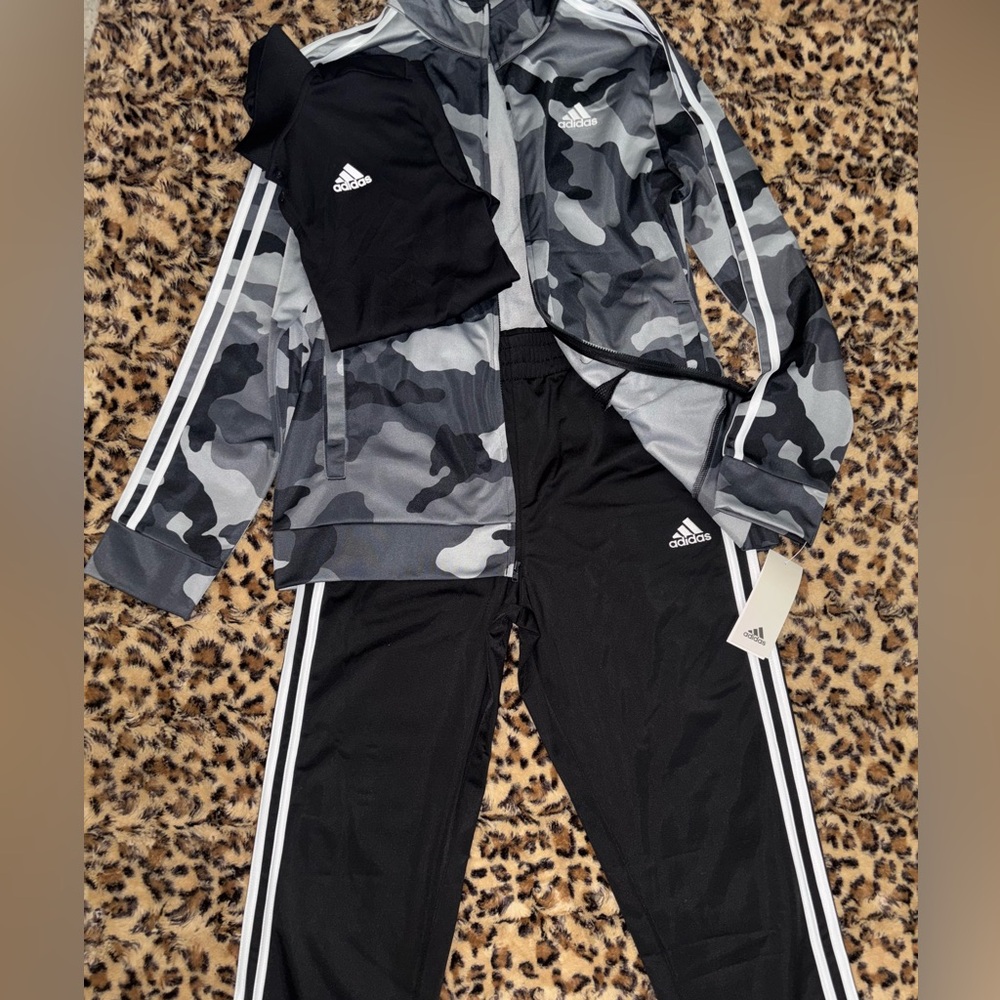 BRAND NEW with tags. Three piece Adidas track suit.
